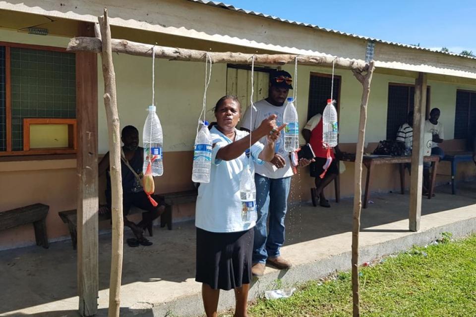 Woman washing her hands