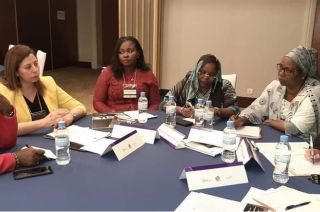 Women sitting around a table during a meeting