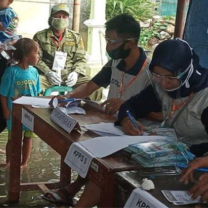 Image of flooded polling station during local elections in Indonesia 2020