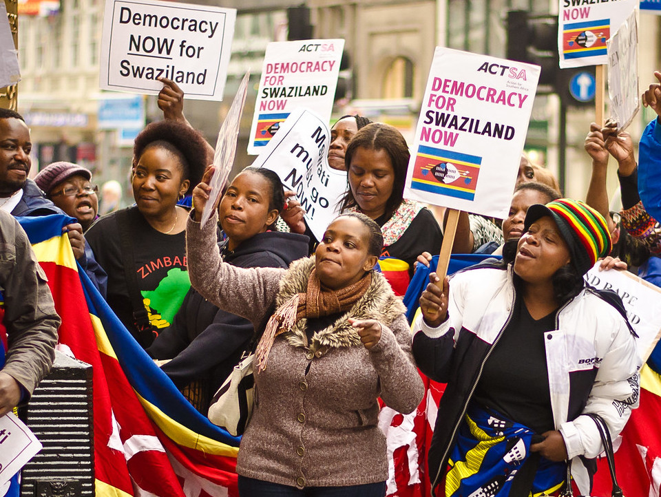 Protestors call for reform at an event in 2012, prior to Swaziland's transition to the name Eswatini. (<a href="https://www.flickr.com/photos/garryknight/7267912010" target="_blank">Photo</a> by Garry Knight / <a href="https://creativecommons.org/licenses/by/2.0/" target="_blank">CC BY 2.0</a>)