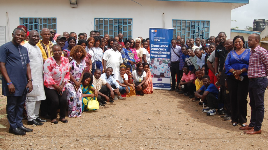 Group photo of participants alongside PPRC and International IDEA staff during the training session in Port Loko.