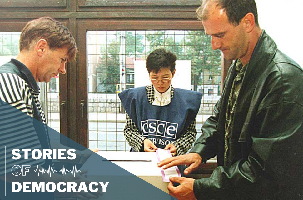 International election supervisors from the OSCE preparing a polling station for voting in Bosnia and Herzegovina.