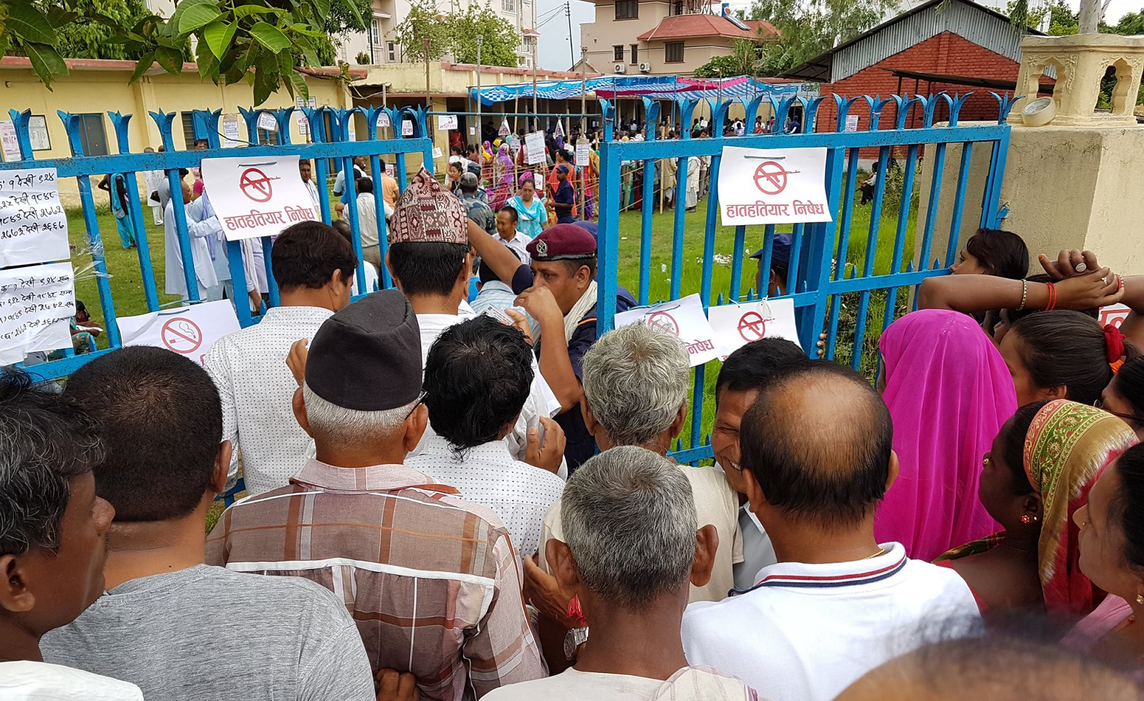 People waiting to vote in Nepal for local representatives for the first time in two decades, 26 June 2017. Photo: Shana Kaiser | International IDEA