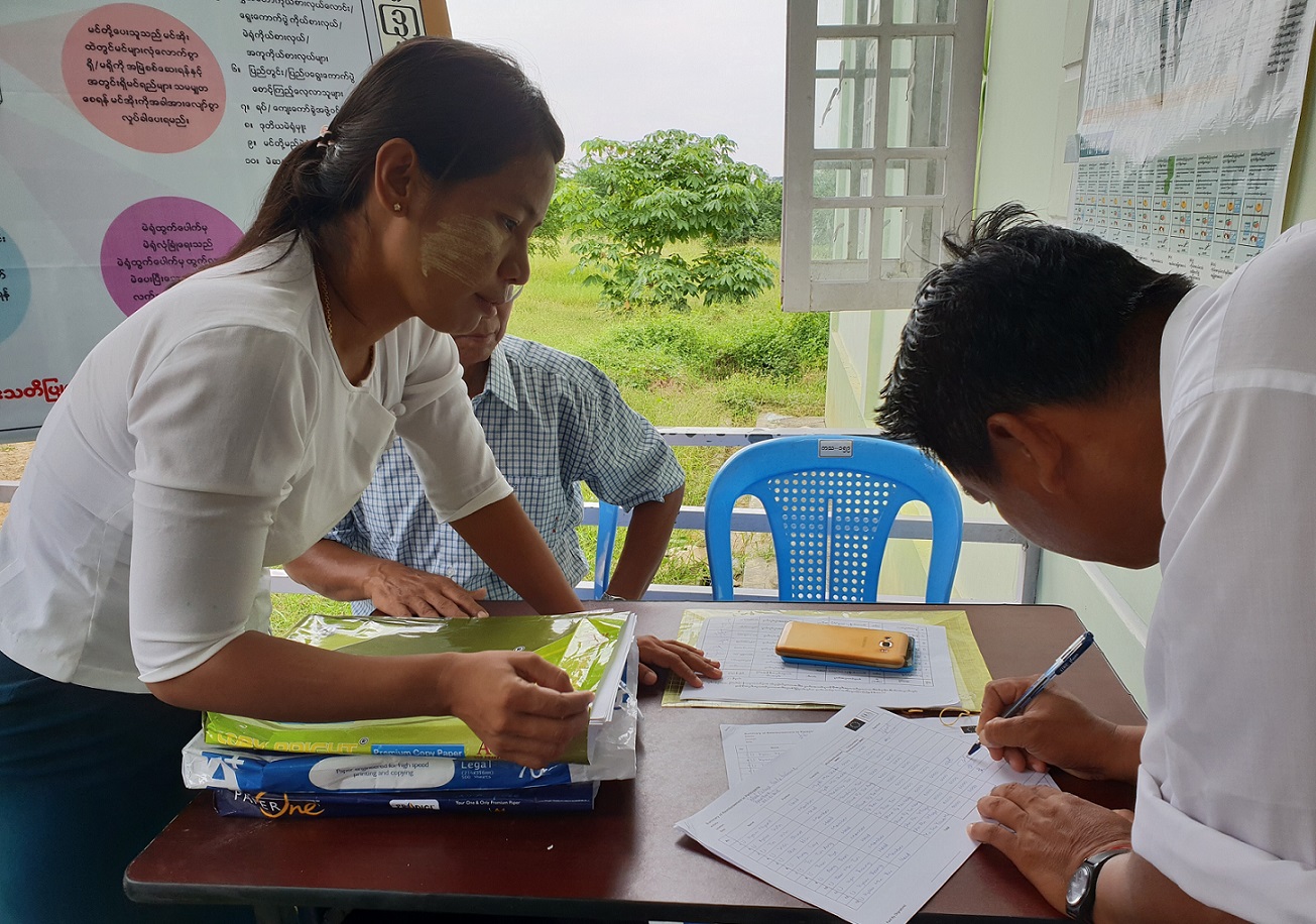 Participant registers for International IDEA-run training on poll monitoring. Image Credit: International IDEA Myanmar