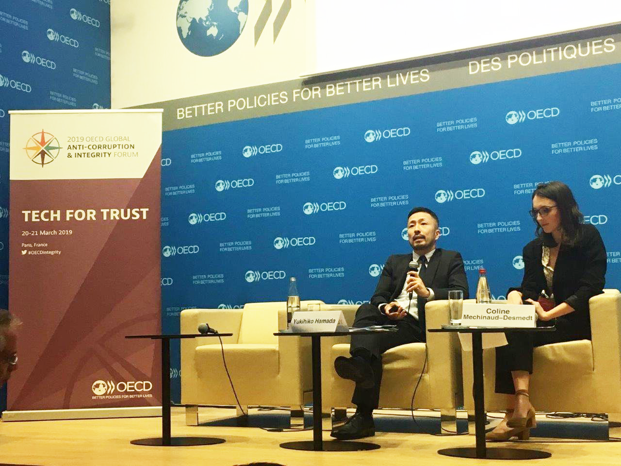 Yukihiko Hamada, at left, during OECD’s annual Global Anti-Corruption and Integrity Forum, March 2019.  International IDEA and the United Nations Office on Drugs and Crime (UNODC), provided an extensive overview of cryptocurrencies’ policy implications at the Forum. Photo credit: OECD.