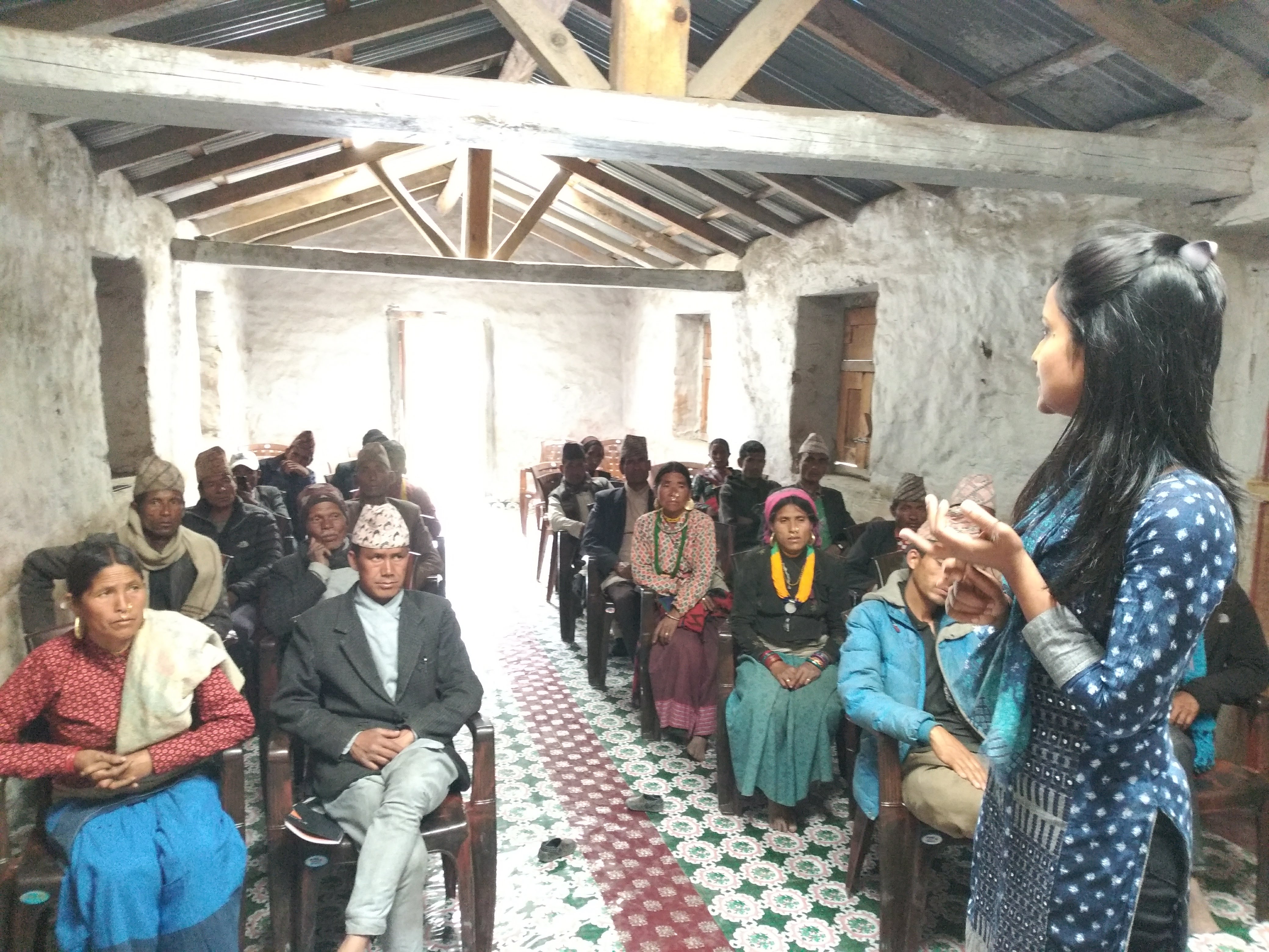 A mentor of International IDEA’s Coherence programme explaining the elected representatives of a Adanchuli Gaunpalika (rural municipality) of Nepal’s Karnali Province about the importance of their Gaunpalika’s strategic vision in annual planning. Photo credit: International IDEA
