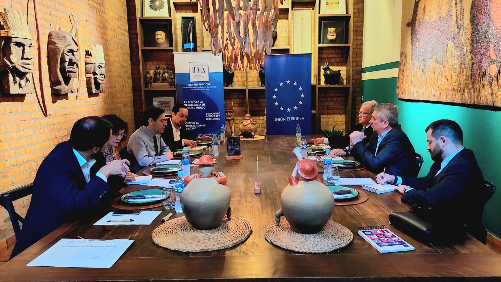 People around a table in a meeting