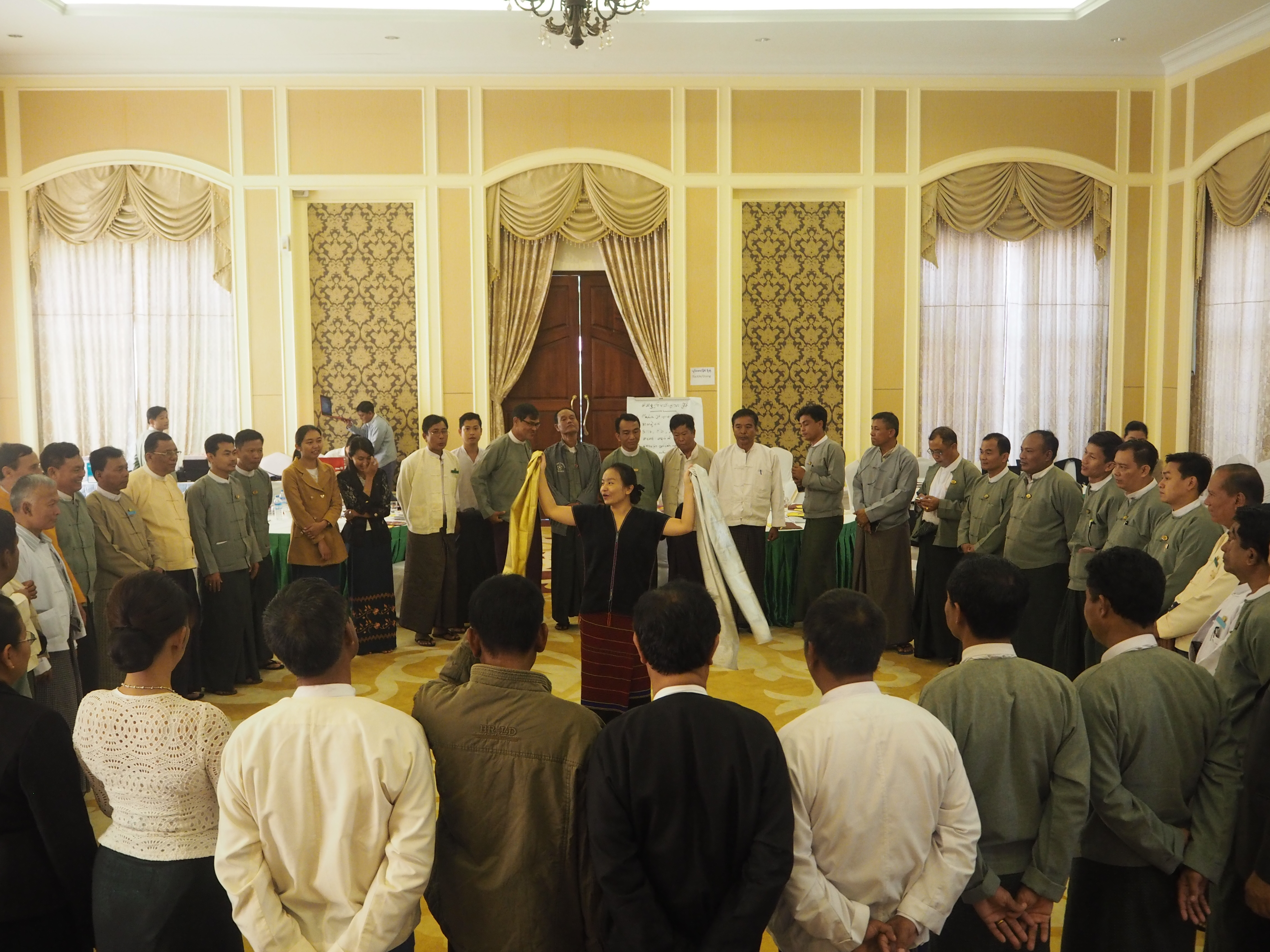 ​ International IDEA's staff member conducting a facilitation icebreaker ​in Nay Pyi Taw. Photo credit: Greg Kehailia