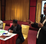 Dipendra Jha introducing draft bill to the members of parliament and civil society actors