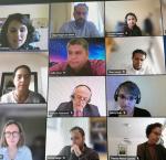 Many experts talking in an online seminar each located  different places