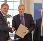Signing ceremony involving the Secretary-General of International IDEA, Yves Leterme, the Charge d’Affaires at the Embassy of Germany to the Kingdom of Sweden, Manfred Schüeler, and the Ambassador of Republic of Tunisia to the Kingdom of Sweden, Ambassador Moez Mehdi Mahmoudi. Photo: Lisa Hagman | International IDEA