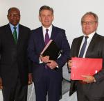 From left: H.E. Dr. Kaire Munionganda Mbuende, Ambassador of the Republic of Namibia to the Kingdoms of Belgium and the Netherlands, the Grand Duchy of Luxembourg, and Mission to the European Union; Andrew Bradley, Director of the Office of International IDEA to the European Union; Carl Michiels, Chairman of the Management Committee of the BTC at a signing ceremony between the BTC and International IDEA on 4 OCtober 2017