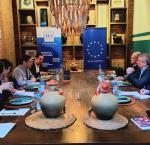 People around a table in a meeting