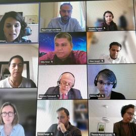 Many experts talking in an online seminar each located different places