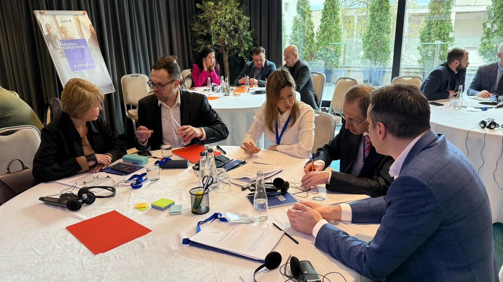 Members of the Central Election Commission of Ukraine are working in a group.