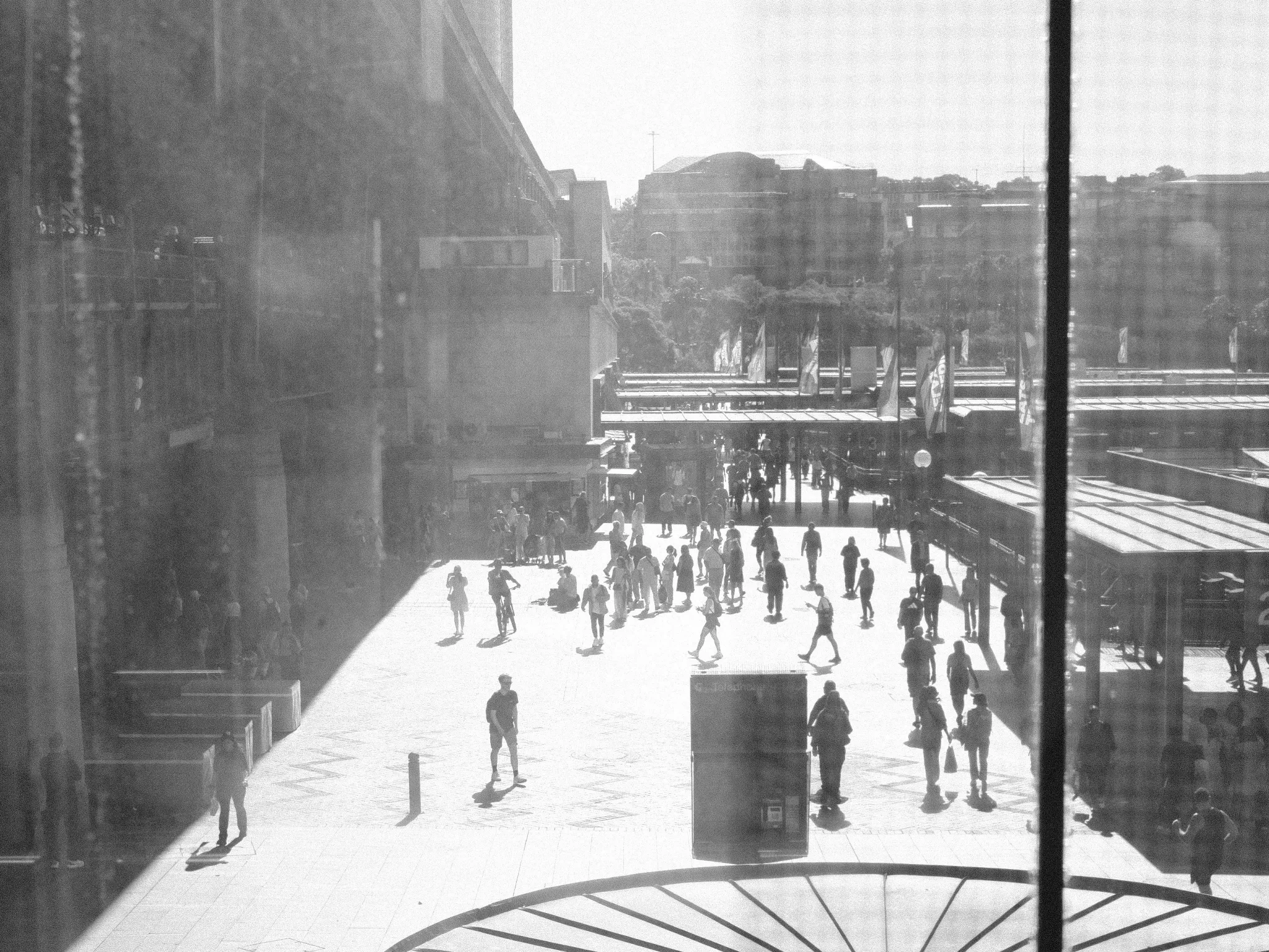 Photo of people walking on a sidewalk in Sydney Australia by Dominic Kurniawan Suryaputra on Unsplash.