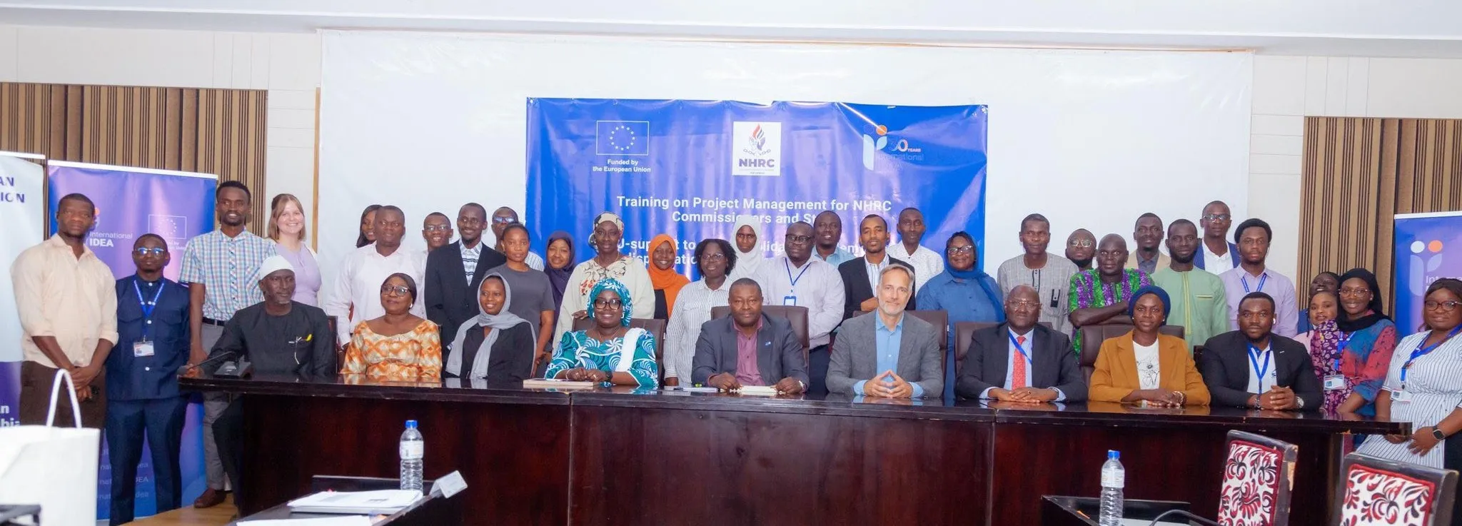 NHRC Commissioners and Staff together with International IDEA Officials during the closing ceremony of the project management training