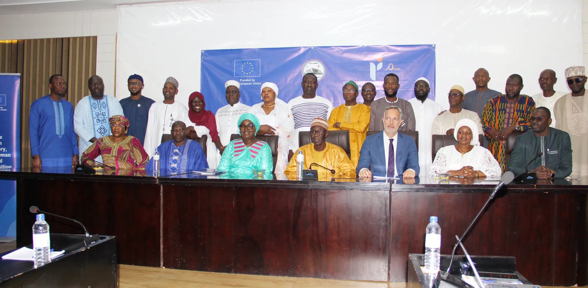Participants posing at the closing ceremony of review of the draft constitution amendment bill on reserved seats for women and persons with disability at the Bakadaji Hotel.