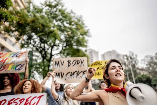 Women in a demonstration for their rights. Image Credit: istockphoto.com.