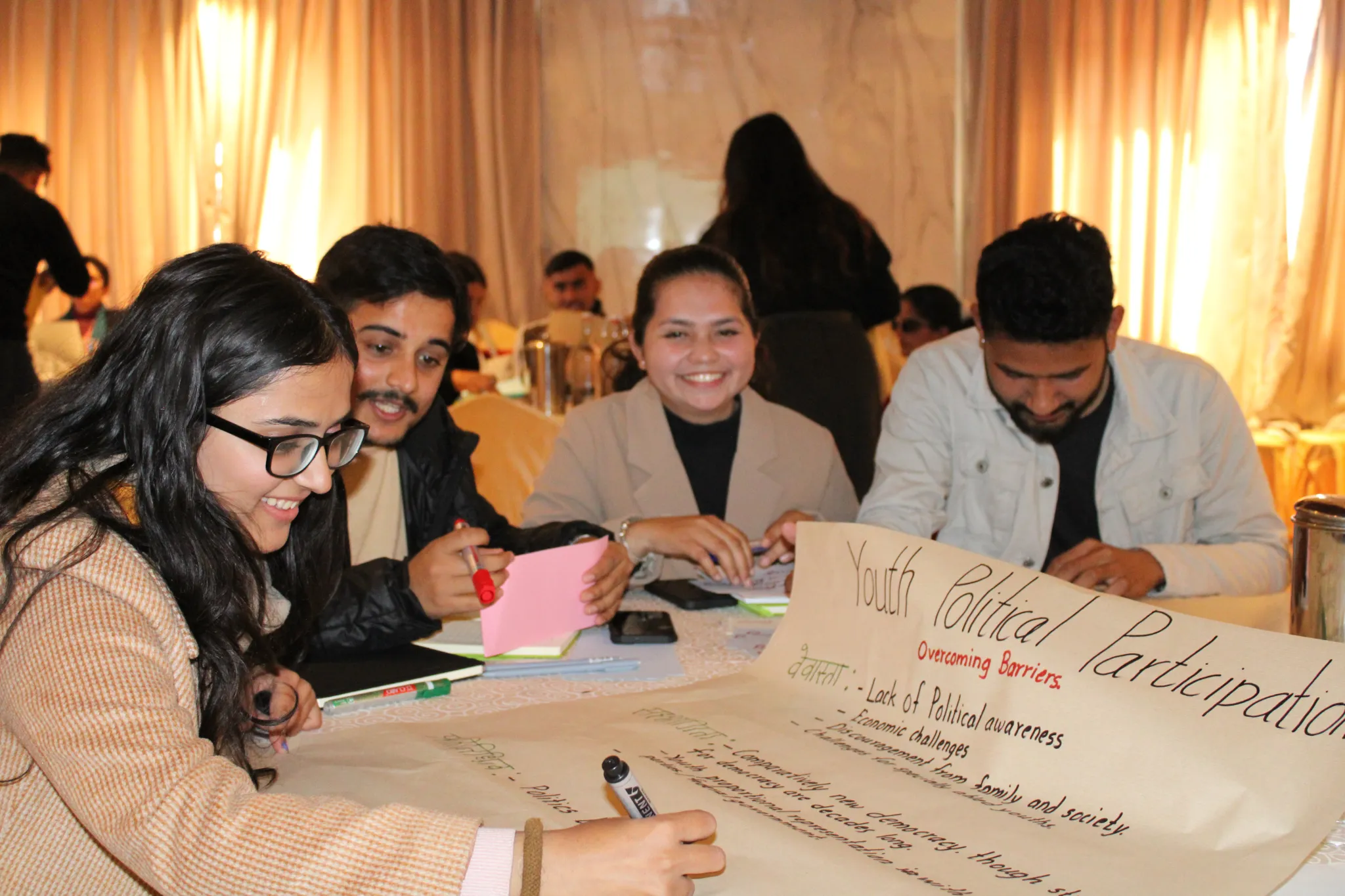 Youth at a provincial deliberation event organized by Yuwa, one of International IDEA’s consortium partners, discussing inclusive youth participation in politics and barriers to political engagement. The event was held from 15 to 18 December 2024, in Pokhara City, Gandaki Province, Nepal. Credit: International IDEA