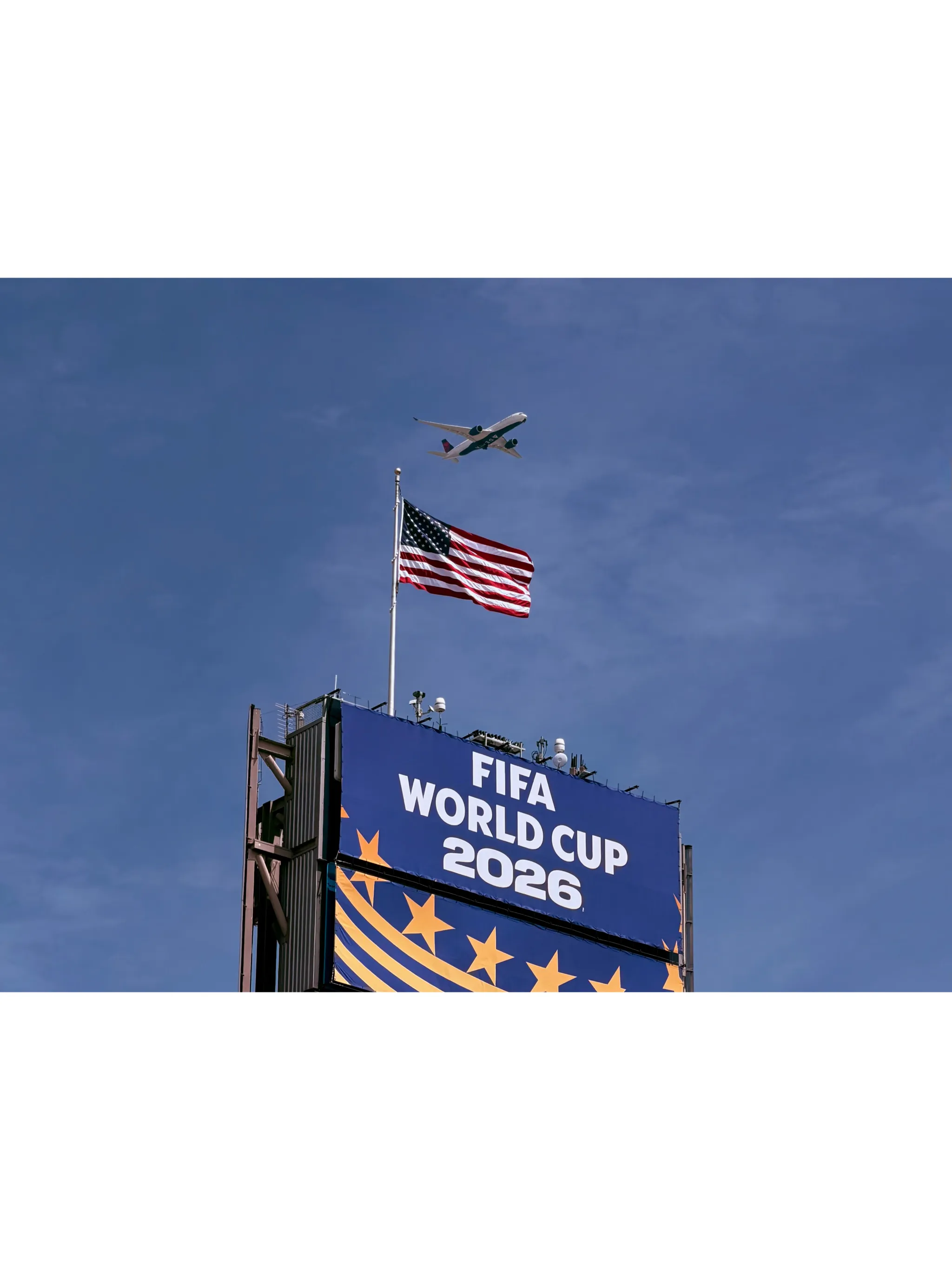 Airplane flying above FIFA World Cup 2026 sign with American flag in Seattle, Washington.. Credit: Dar ius via pexels
