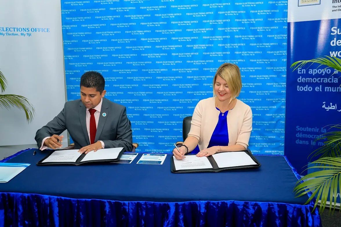 Ms Leena Rikkilä Tamang, Regional Director for Asia & the Pacific, International IDEA, signed the Memorandum of Understanding with Mr Mohammed Saneem, Supervisor of Elections, in Suva, Fiji, 27 July 2018 (Photo credit: Fijian Elections Office)