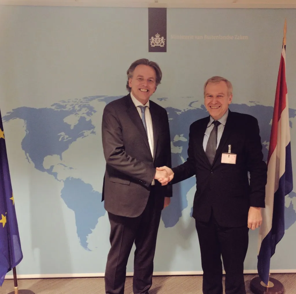 Dutch Foreign Minister Bert Koenders greets International IDEA Secretary General Yves Leterme in The Hague, The Netherlands