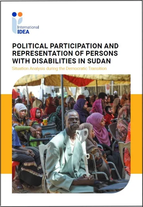 Sudanese disabled persons sitting at a voting station