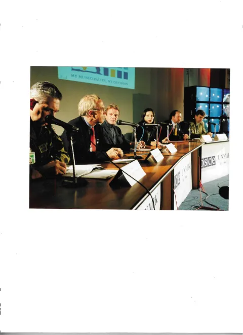 OSCE Head of Mission Daan Everts (left), UN SRSG Dr. Bernard Kouchner (center), Jeff Fischer (right), and Others at a News Conference