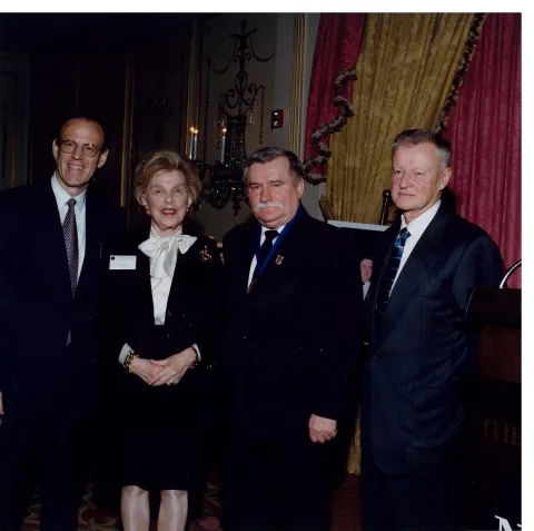 Gershman (left) with Solidarity leader and former Polish President Lech Walesa (second from right) at NED’s 10th anniversary celebration in 1999 of the Round
