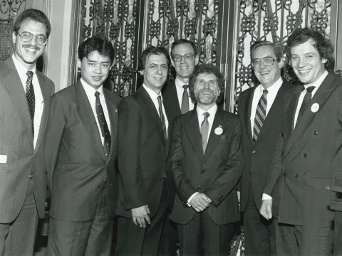 Gershman (center) at event in January 1990 celebrating the launch of the Journal of Democracy