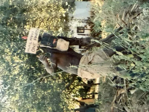 A citizen with a poster - Malawi One Party