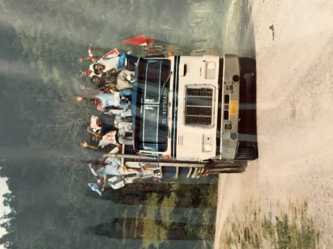 Honduras Observation Mission 1993, Olancho province. People on truck celebrating. 