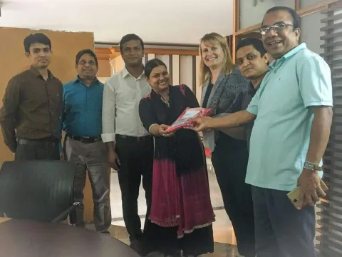 Gina Bjornlund with DI Bangladesh Staff (2022)