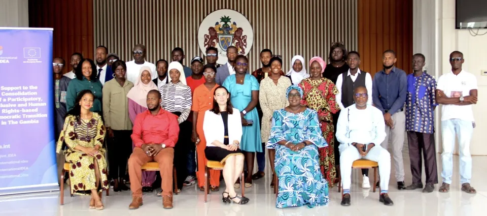 Representative from the Ministry of Justice, President of the Gambia Press Union, Head of International IDEA Country Office and Staff, and participants from various media outlets