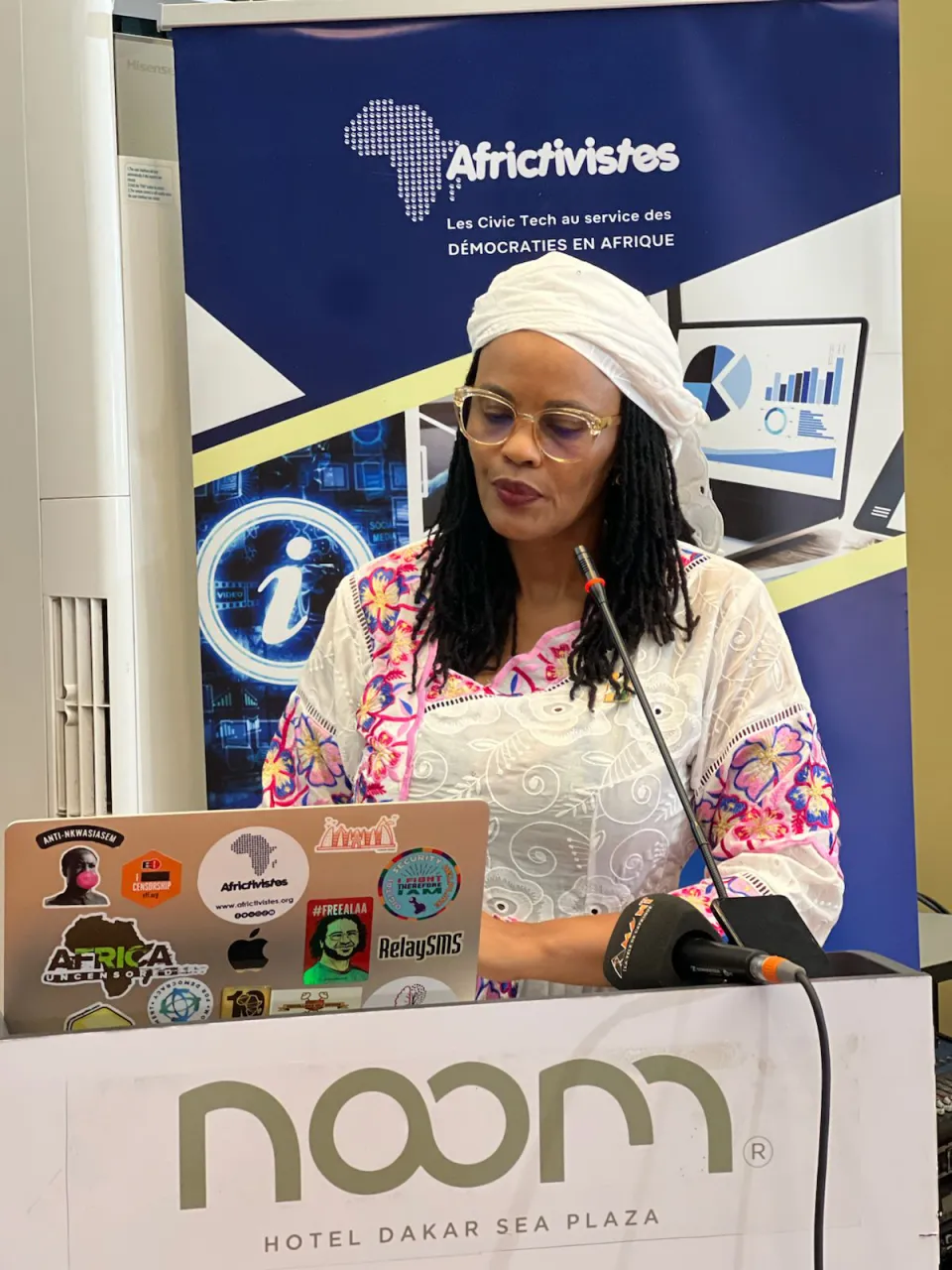 Aisha Dabo from AfricTivistes, presenting the Report