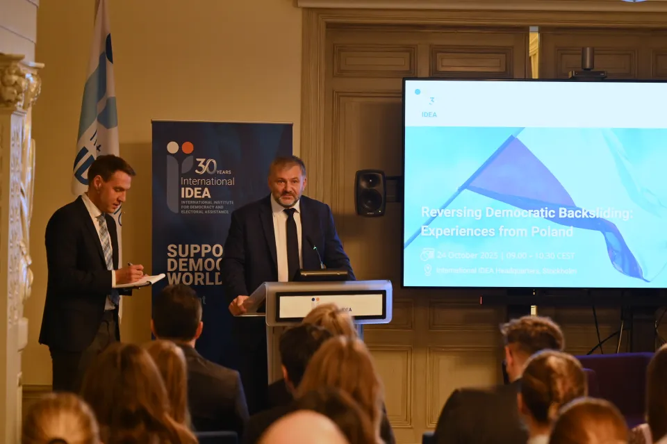 Interpreter Andrzej Rossa and Polish Minister of Justice Waldermar Żurek