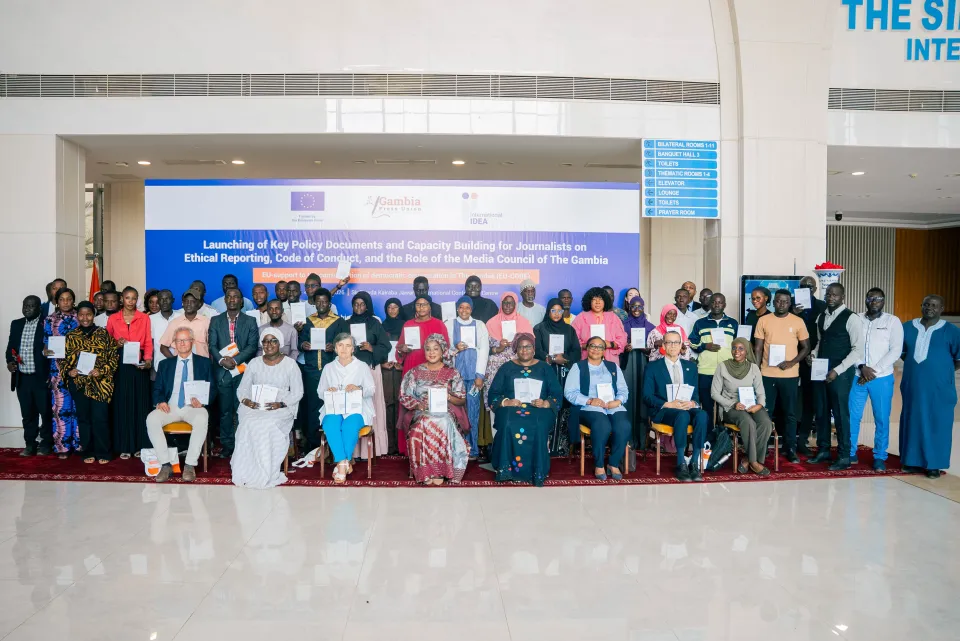 Participants posed for a group photo while displaying documents during the launch of key media policy documents on February 3, 2026, at the Sir Dawda Kairaba Jawara International Conference in Banjul, The Gambia.
