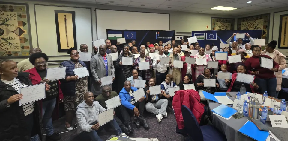 Participants hold certificates from the Training of Trainers workshop on the integration of Civic and Voter Education in Lesotho, June 2026.