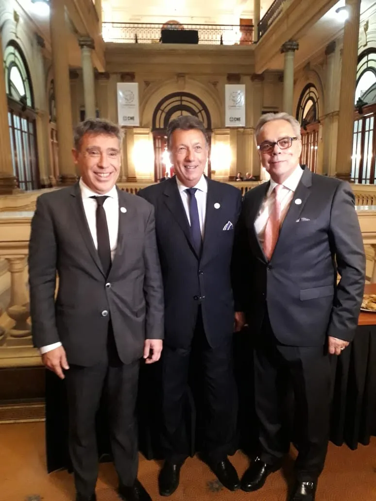 Chair of the CNE, Santiago Corcuera (left); Vice-Chair of the CNE, Alberto Dalla Vía (center); Director for Latin America and the Caribbean Region of International IDEA, Dr Daniel Zovatto (right)