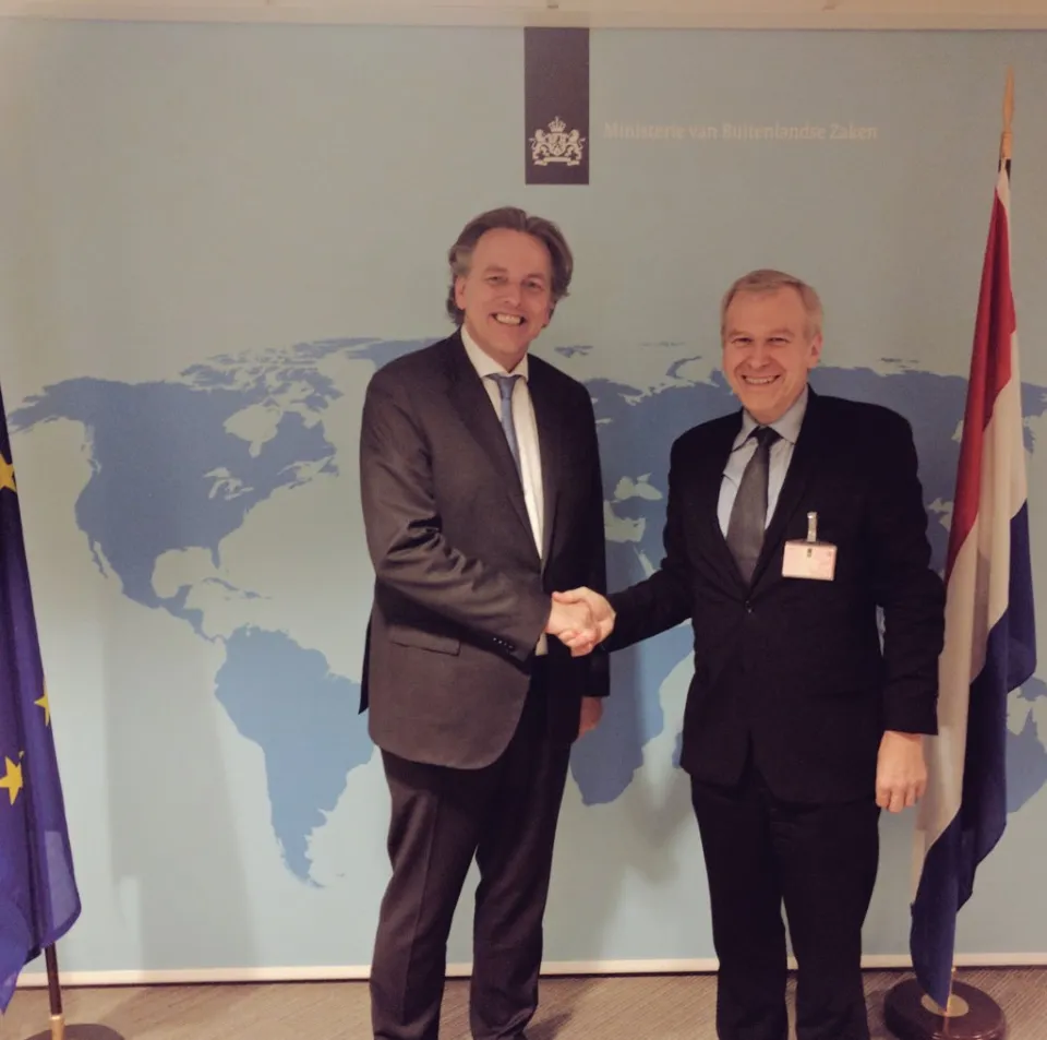 Dutch Foreign Minister Bert Koenders greets International IDEA Secretary General Yves Leterme in The Hague, The Netherlands