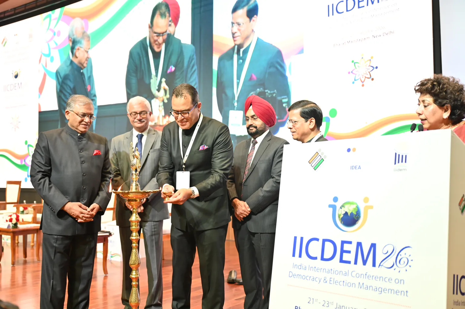 Panelists at the opening of the IICDEM 2026 conference.