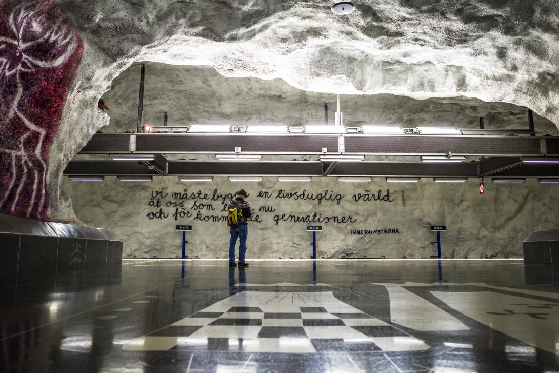 A quote by Swedish chemist Hans Palmstierna decorates the walls of the Tensta subway station, a suburb of Stockholm and Ahmed Abdirahman’s hometown. It reads: ‘We must build a viable world for us who live now and for generations to come.’. Photo by: Alexander2323 (2021)