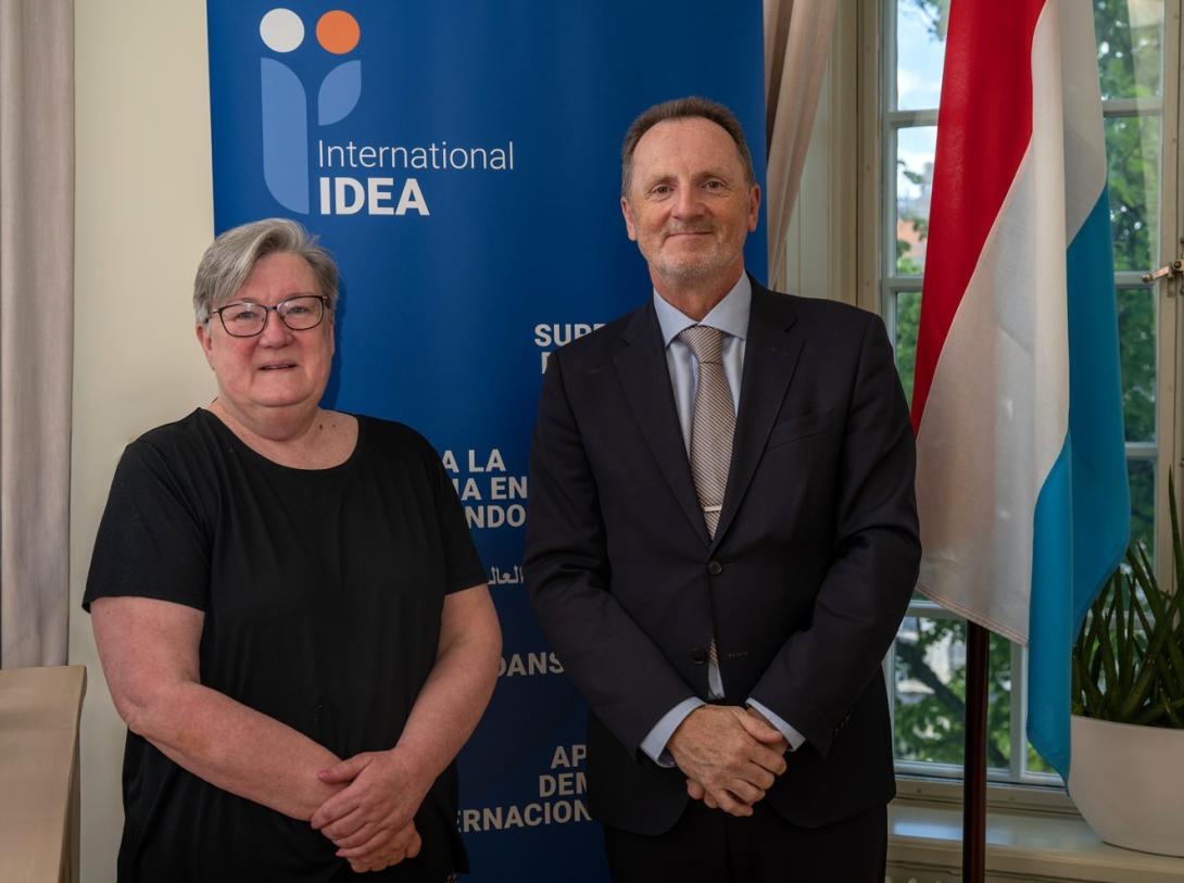 Executive Director of International IDEA, Fiona Rowley and Ambassador of Luxembourg, Henri Schumacher.